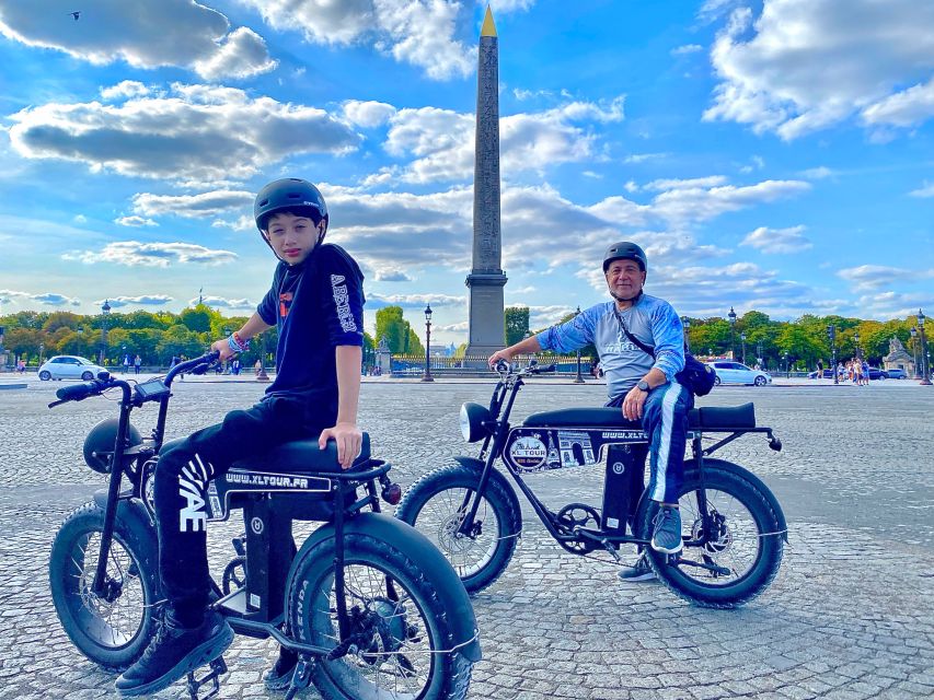 Paris: Eiffel Tower and Notre Dame Night Tour by E-Bike - The Louvre and Tuileries Gardens set the tone