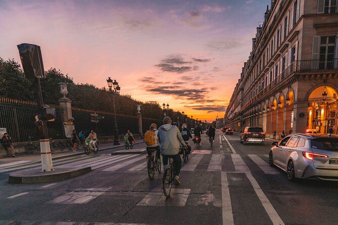 Paris Evening City of Lights Small Group Bike Tour & Boat Cruise - Notre Dame, the river, and the city after dark