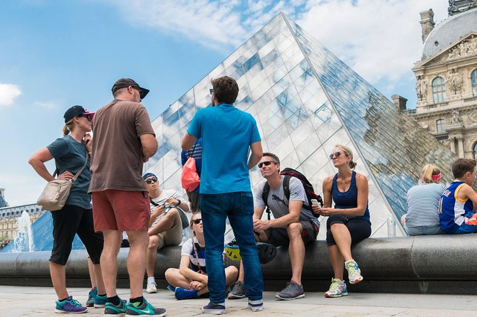 Paris Highlights Bike Tour: Eiffel Tower, Louvre and Notre-Dame - Rue Cler and the mid-tour break