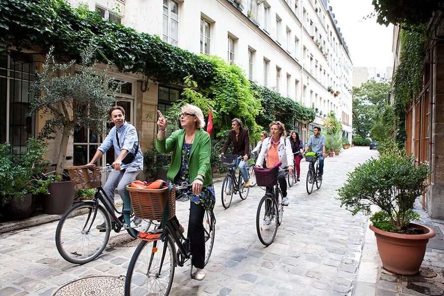 Paris Marais Bike Tour with Cheese & Sweet Tastings - Riding through the Marais and Jewish Quarter