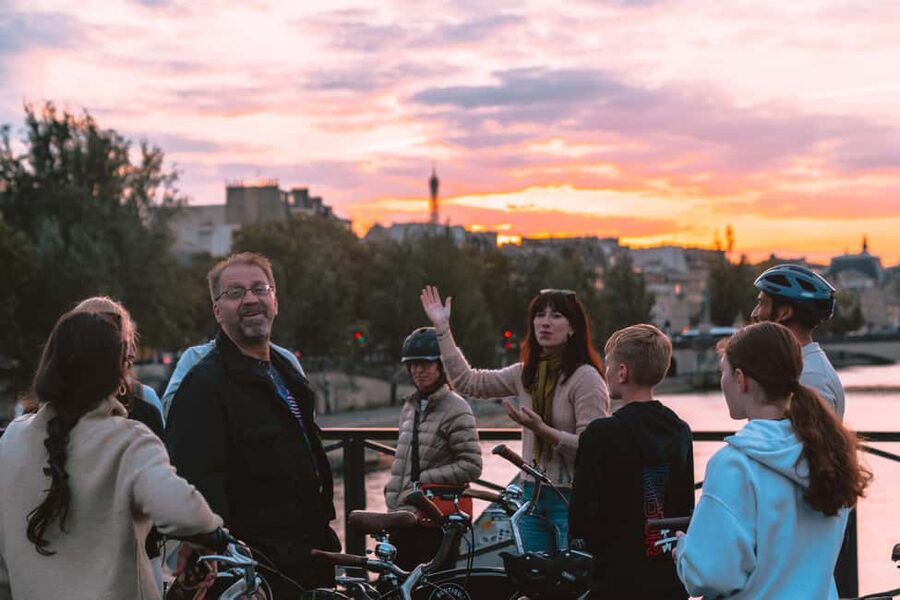 Paris: Night Small-Group Bike Tour & Boat Cruise - Champs-Élysées and the evening finish