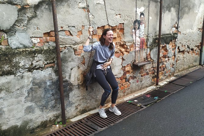 Penang George Town All-In-One Heritage Tour By Bicycle & Trishaw (Metro Bike) - Hock Teik Cheng Sin Temple and the 1867 Penang Riots