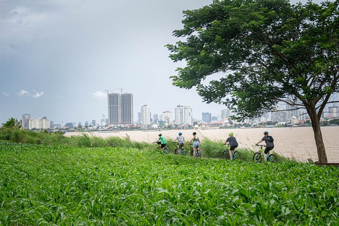 Phnom Penh Silk Island Bike Tour/ E-Bike or Tuk Tuk - Temples, tofu, markets, and unexpected stops