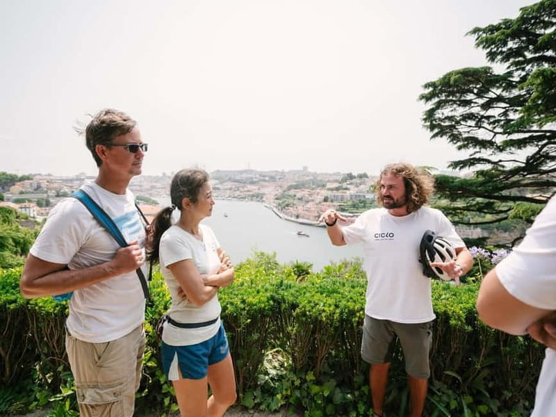 Porto: Highlights in 3 Hours E-Bike Tour - Crossing toward Porto Cathedral