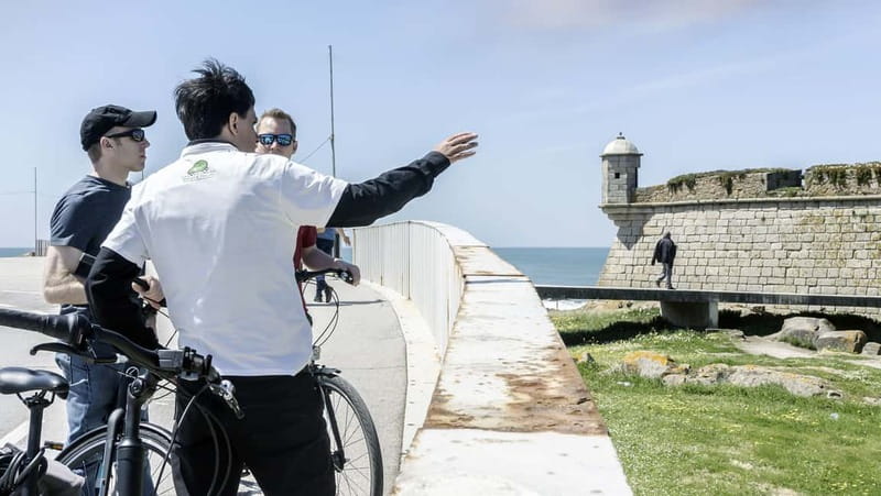 Porto Private E-Bike Tour: Douro River, Parks & Beaches - Crossing the city edge near Arrábida Bridge