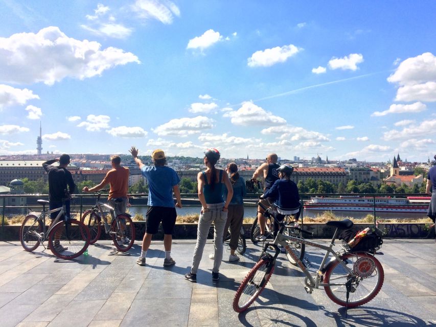 Prague: Stunning Viewpoints, Castle, City & Park Bike Tour - Crossing Hlávkův most and following the Vltava