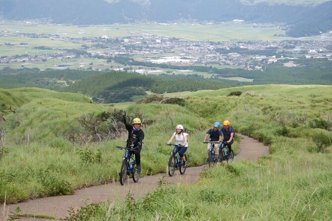 Private E-MTB guided cycling around Mt. Aso volcano & grasslands - The climb to Nakadake Crater