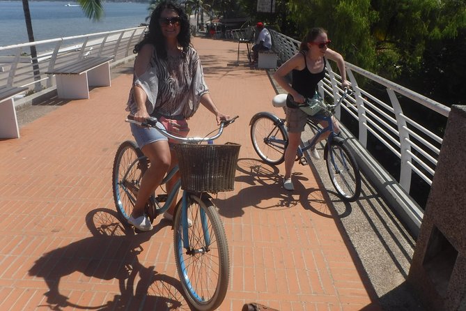 Private Tour in El Malecon Boardwalk Bike Ride - Cuale Island, the market, and the old Hollywood connection