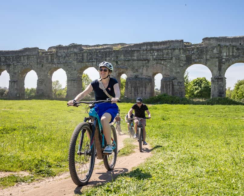 Rome: Appian Way & Aqueducts E-Bike Tour (Catacombs & Food) - Riding the Appian Way past Roman ruins