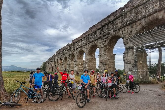 Rome: Appian Way E-bike Tour, Catacombs, Aqueducts & Transfer - Riding the ancient Appian Way