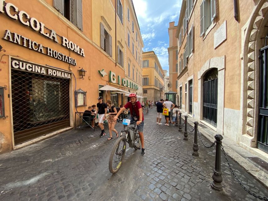 Rome :guided night e-bike tour with typical ice-cream - Trastevere and the Tiber crossing