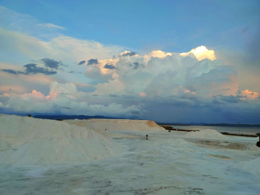 Sant'Antioco: Guided E-Bike Excursion at Sunset - Riding between water, salt, and old machinery