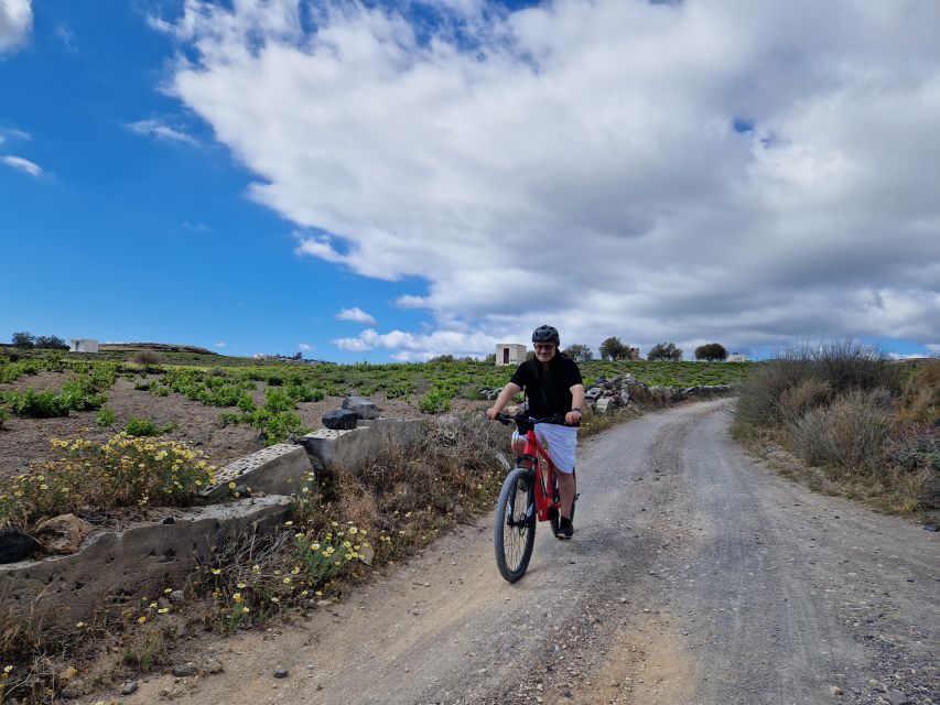 Santorini: E-Bike Sunset Tour Experience - Pickup, weather, and simple preparation