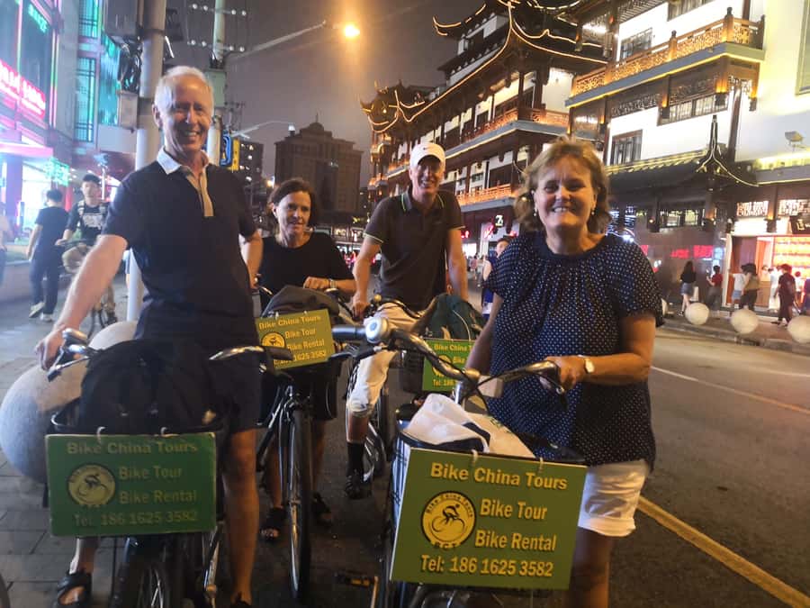 Shanghai: 4-Hour Nightlife Adventure & Tasting Bike Tour - Xintiandi’s polished evening scene