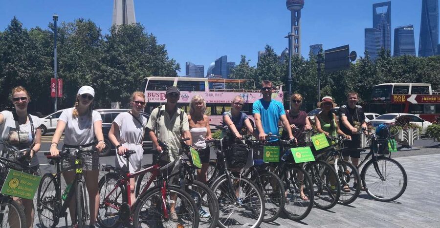 Shanghai: Full Day Classic Bike Tour With an Authentic Lunch - Through Nongtang lanes and Shikumen neighborhoods