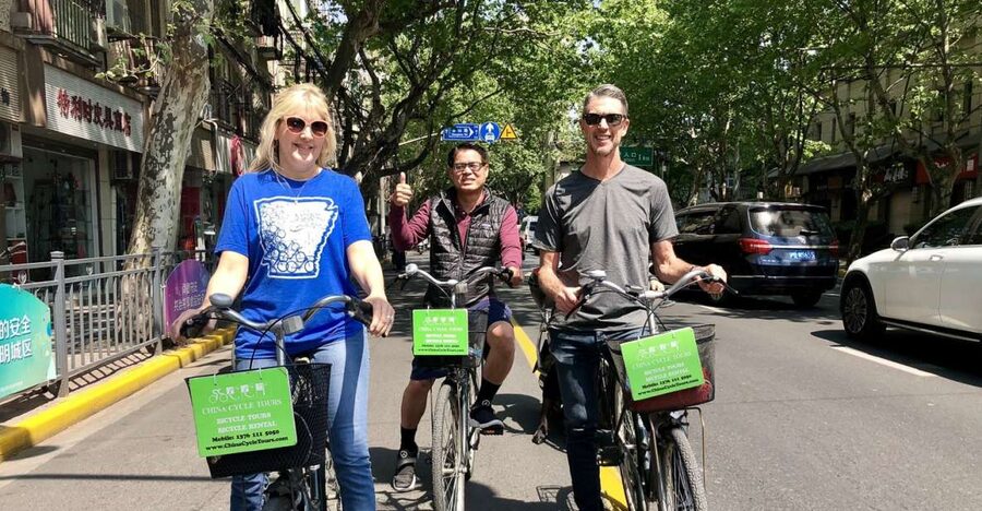 Shanghai: Half-Day Biking and Local Food Tour - Riding through the French Concession