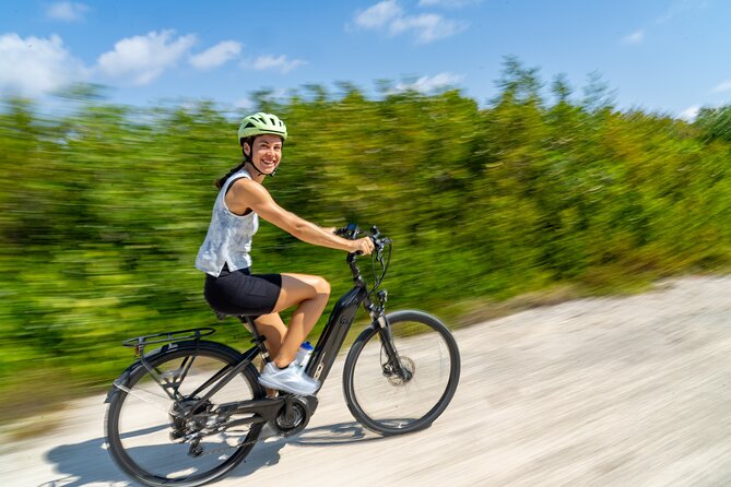 Small Group E-Bike Grand Cayman Ecological Half-Day Tour - Batabano Road and the North Sound view