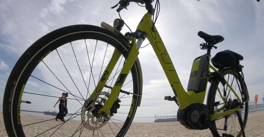 South Lisbon: 3-Hour Christ the King Electric Bike Tour - Crossing the Tagus on the cacilheiro