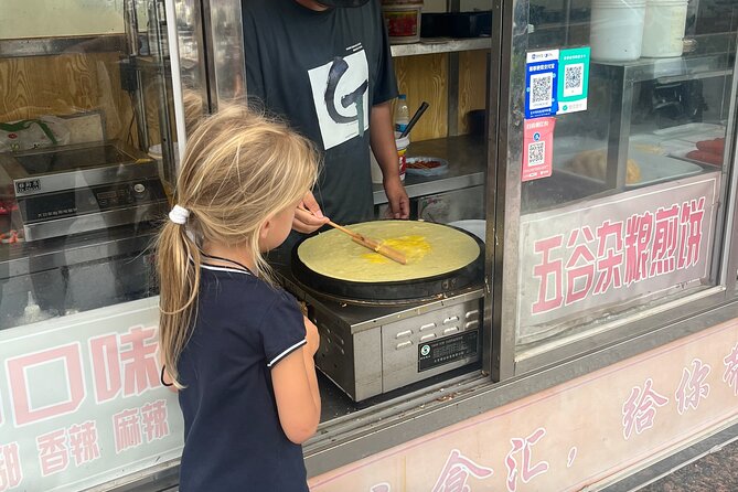 Street Food in Beijing Hutongs by Bike - Riding an e-bike through the lanes
