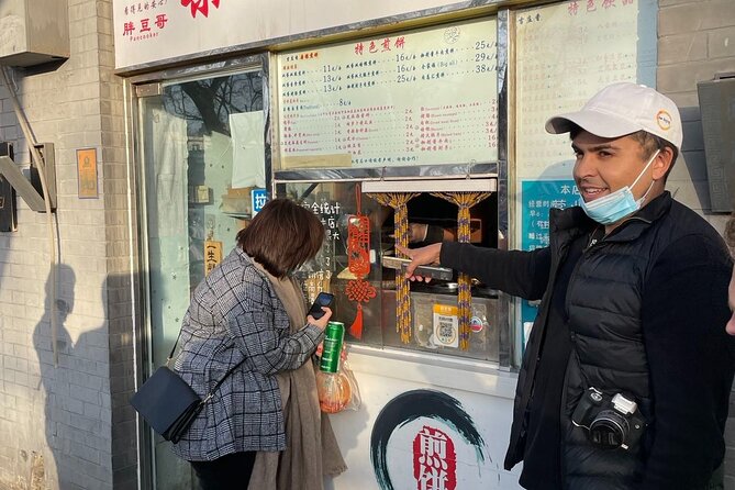 Street Food in Beijing Hutongs by Bike - Food stops that go beyond a standard Beijing meal