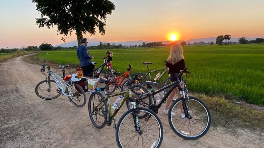 Sukhothai: 2.5-Hours Guided Countryside Sunset Bike Tour - Sunset beneath the Khao Luang mountains