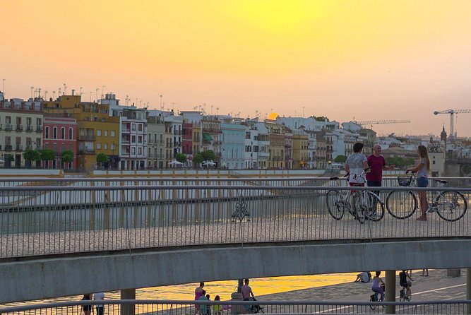 Sunset Guided Bike Tour in Seville - The river, Torre del Oro, and Triana