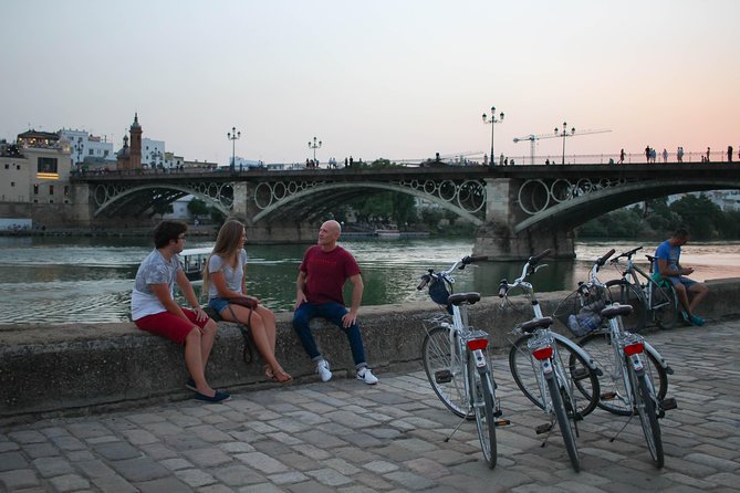 Sunset Guided Bike Tour in Seville - Santa Ana, San Telmo, and the old tobacco factory