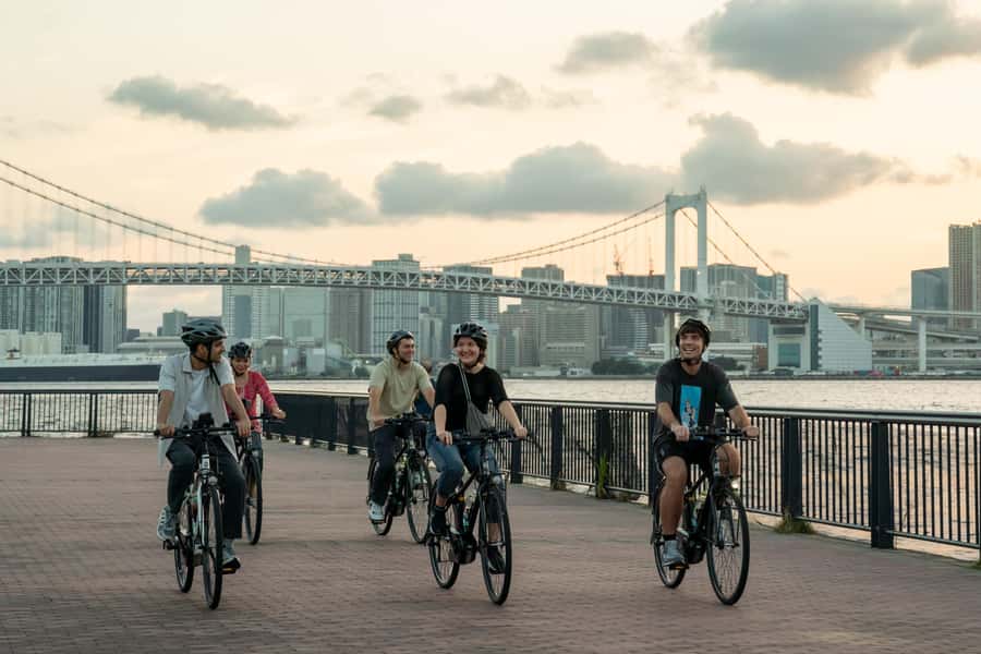 Tokyo Bay Area: Sunset Night View 3h E-bike Guided Bike Tour - What the guides add to the ride