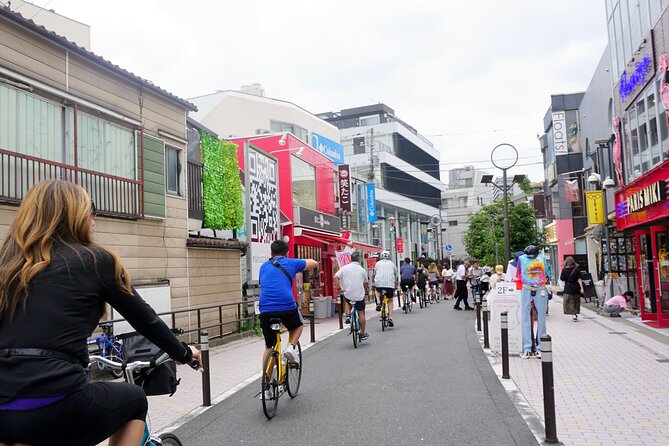 Tokyo Great Cycling Tour - Zojo-ji Temple and the Tokyo Tower contrast