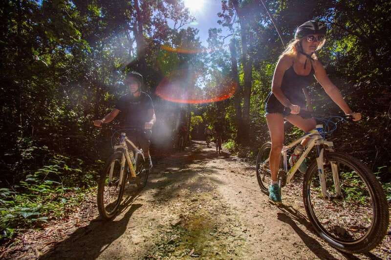 Tulum: Cenote Trail Bike Tour - The zip lines and canoe option