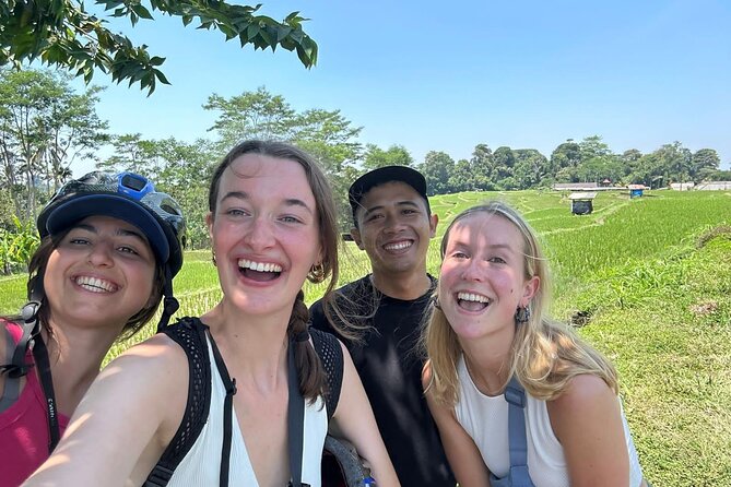 Ubud: Downhill Cycling with Volcano, Rice Terraces, and Meal - Rolling through villages, farms, and rice paddies