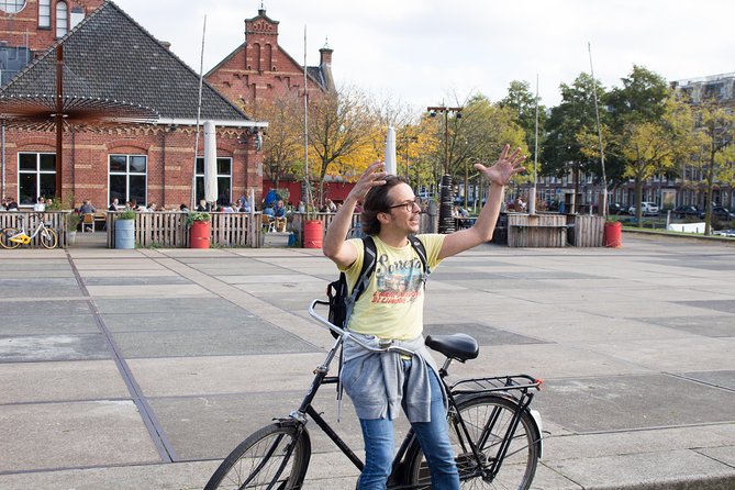 Urban Adventures Amsterdam Bike Tour, Graffiti and Magnet Fishing - Pllek offers a relaxed pause in shipping containers