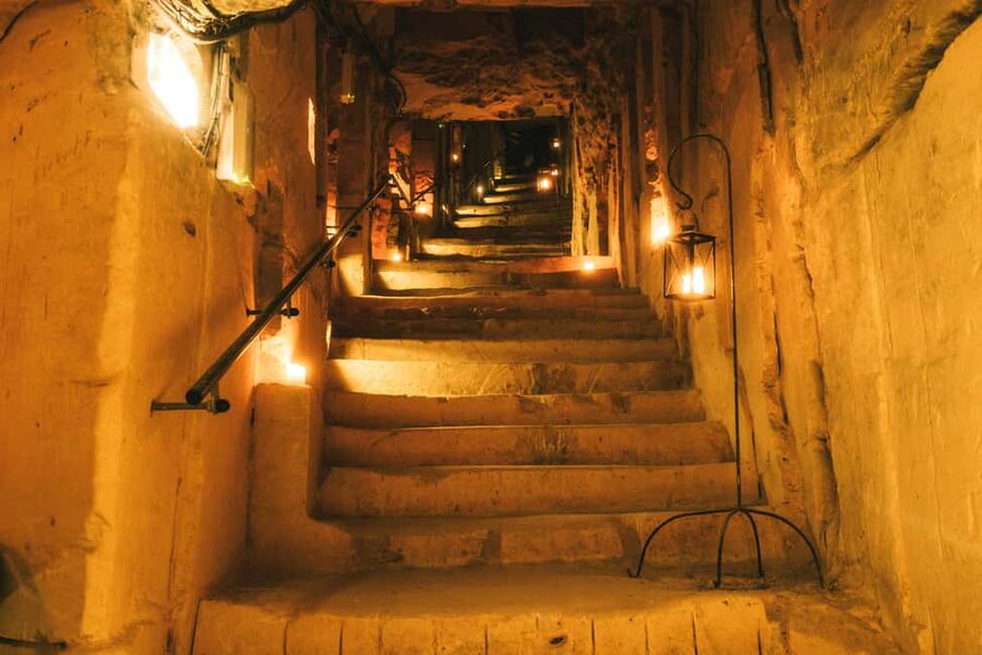 Valkenburg: Cave Biking Underground Bike Tour - Getting to the yellow limestone meeting house