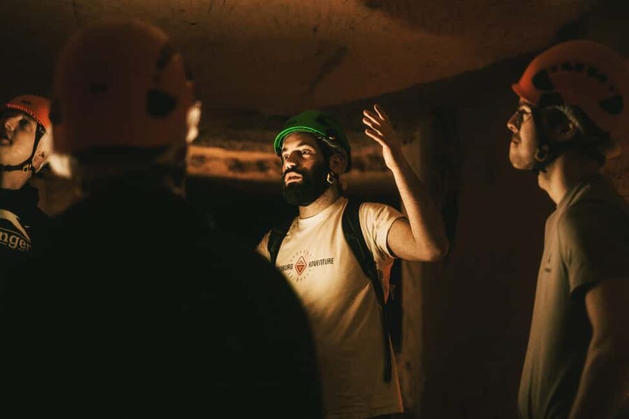 Valkenburg: Cave Biking Underground Bike Tour - The 163-step descent sets the tone