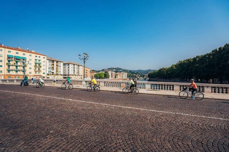 Verona e-bike tour: city center and panoramic views - Crossing Ponte Pietra to the hilltop view